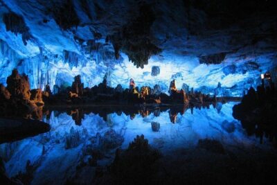 7 - Day North to South Island Grand Tour - Auckland to Queenstown - Day 1: Waitomo Caves Glow Worm Magic to Rotorua’s Hot Culture