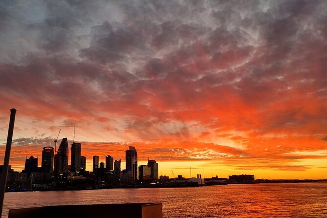 Auckland Sunset Harbour Cruise - The Red Boats onboard: open deck, bar service, and comfort expectations