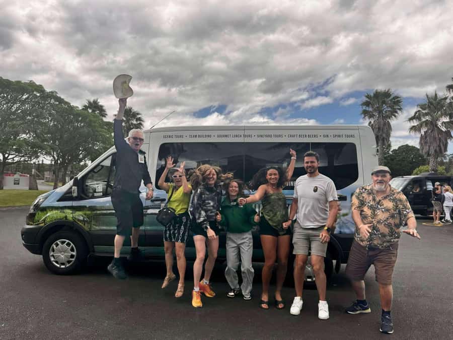 Auckland: Wine region tour with tastings and gourmet lunch - Leaving Auckland CBD: Harbour Bridge, coast, and forest drive